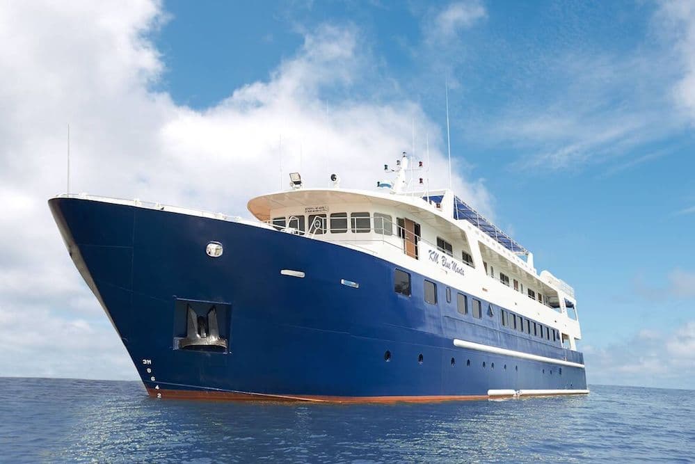 Blue Manta liveaboard docked at anchor